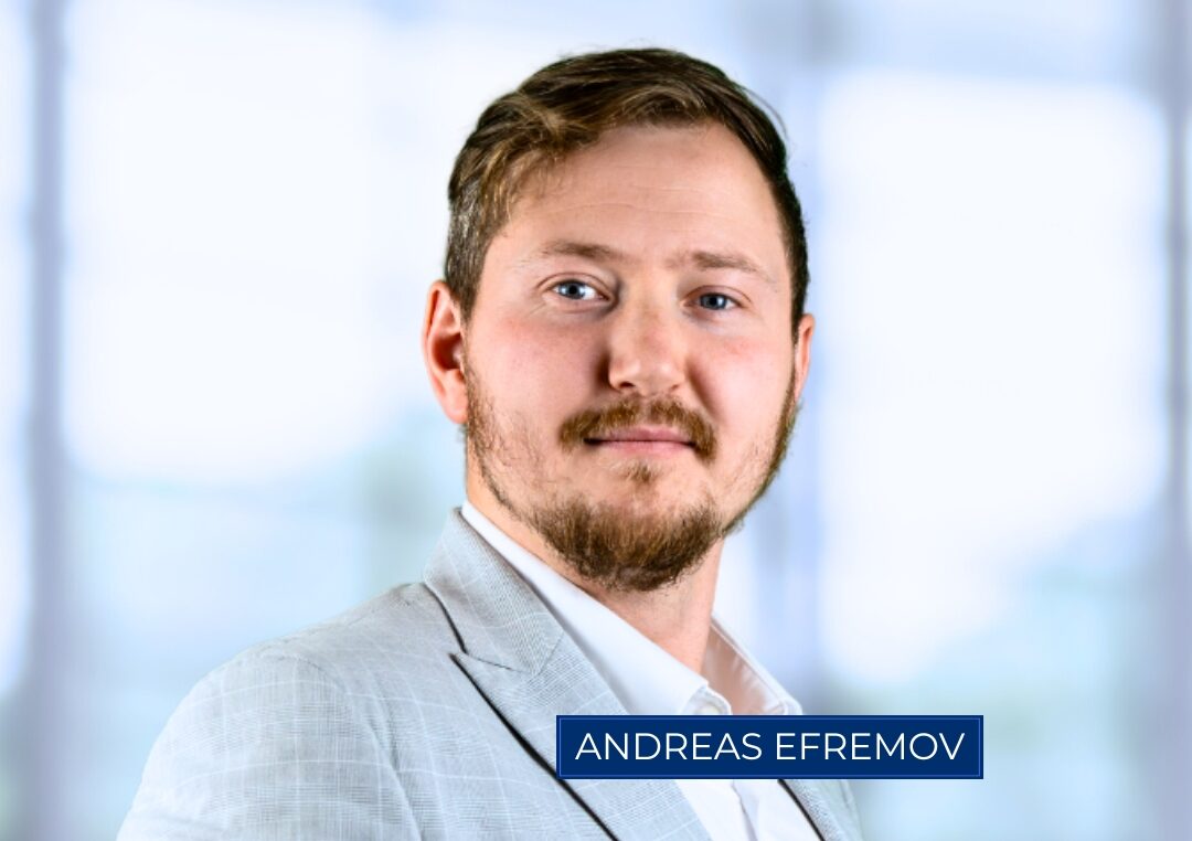 Porträt eines Mannes mit einem Namensschild: Andreas Efremov.