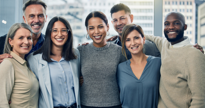 Shot of a team of colleagues together in their office